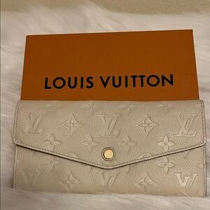 Louis Vuitton Cream Monogram Embossed Leather Wallet